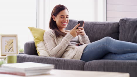 an-attractive-young-woman-using-a-cellphone