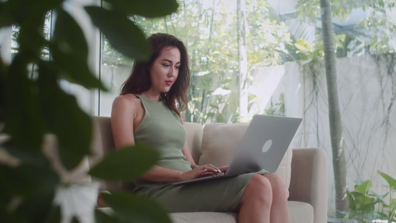 Caucasian Businesswoman Using Laptop Working at Home