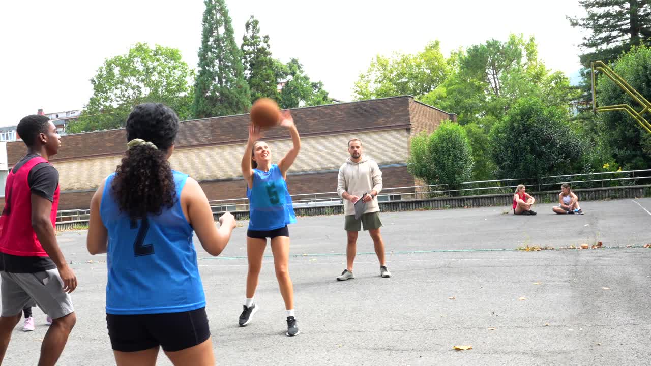 Basketball team training session with coach