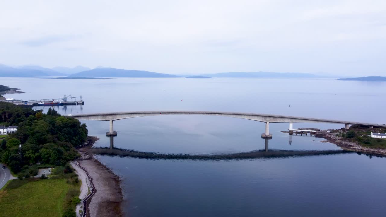Skye Bridge on Isle of Skye, West Coast of Scotland, Highlands, Aerial Drone 4K HD Footage Fly In