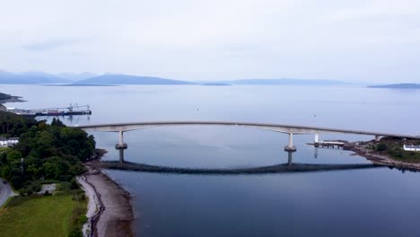 skye bridge on isle of skye, west coast of scotland, highlands, aerial drone 4k hd footage fly in