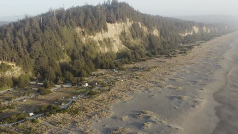 a panning shot of a rural campground near the ocean