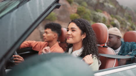 friends on a road trip in a convertible
