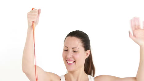 happy female athlete holding medal