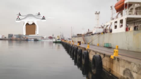 drone carrying a box in a port