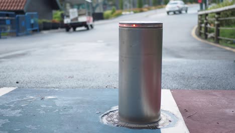 close up of a silver automatic bollard