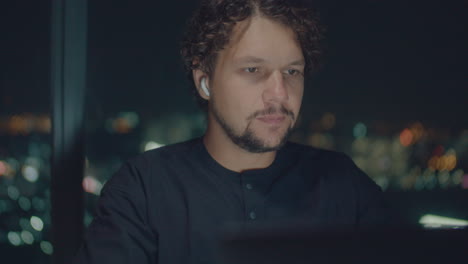 lose-up portrait of a white man illuminated from the screen