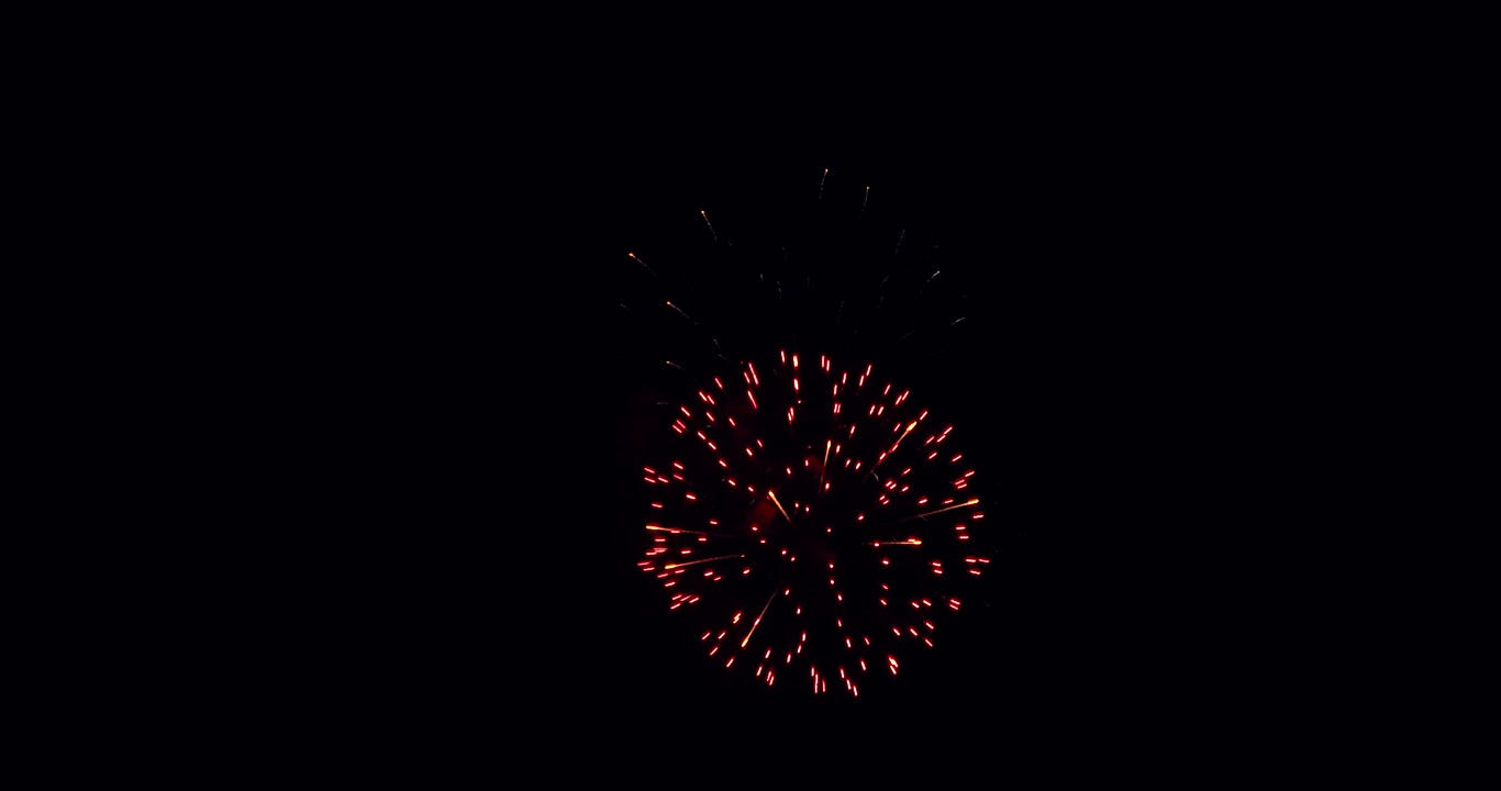 Aerial footage of a fireworks display at night time