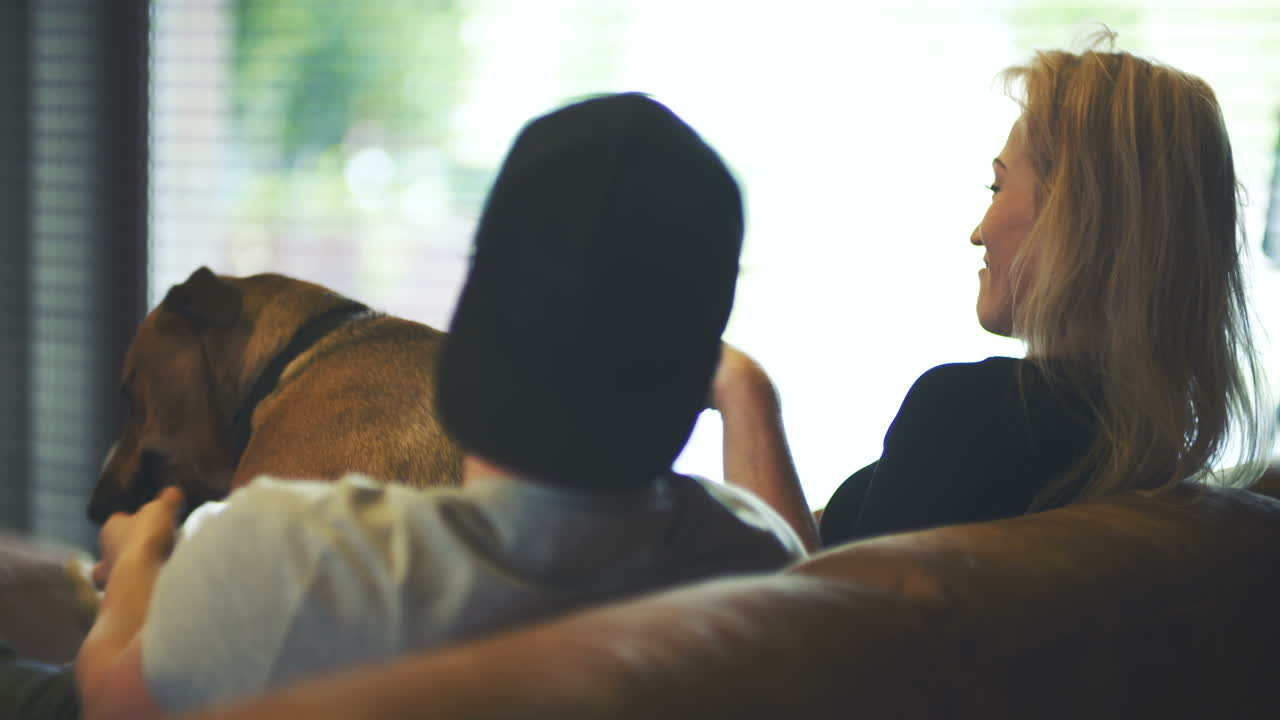 Man Having Fun With Dog At Home 3