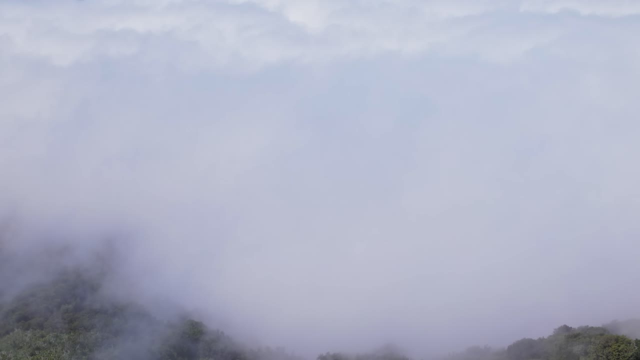 Stunning aerial view of clouds over Madeira, Portugal captured by drone