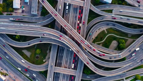 aerial view of a complex highway interchange with active traffic