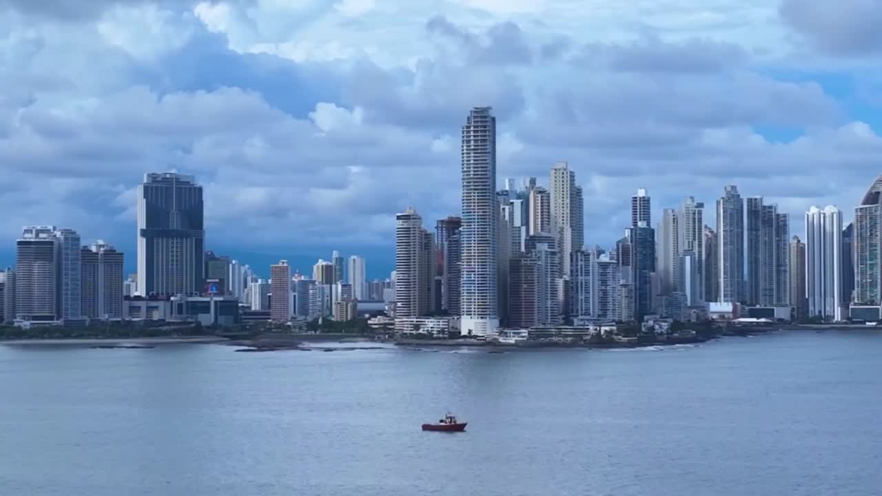 Panama City, Panama with clouds. Drone dolly right to left HD