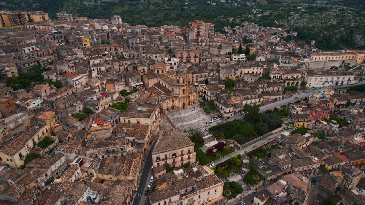 Aerial view of curved stairway of San Giorgio Cathedral at Modica historic old town. Sicily, Italy