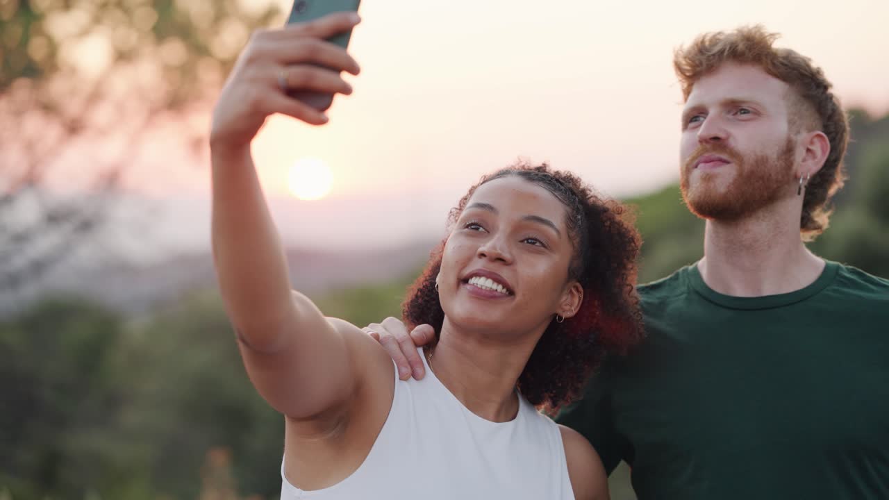 Couple Taking Selfie at Sunset