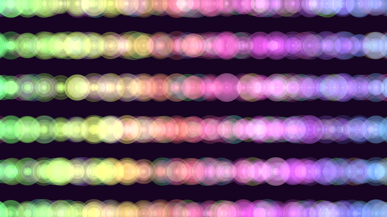 círculos coloridos en espiral vibrante en patrón sobre fondo negro