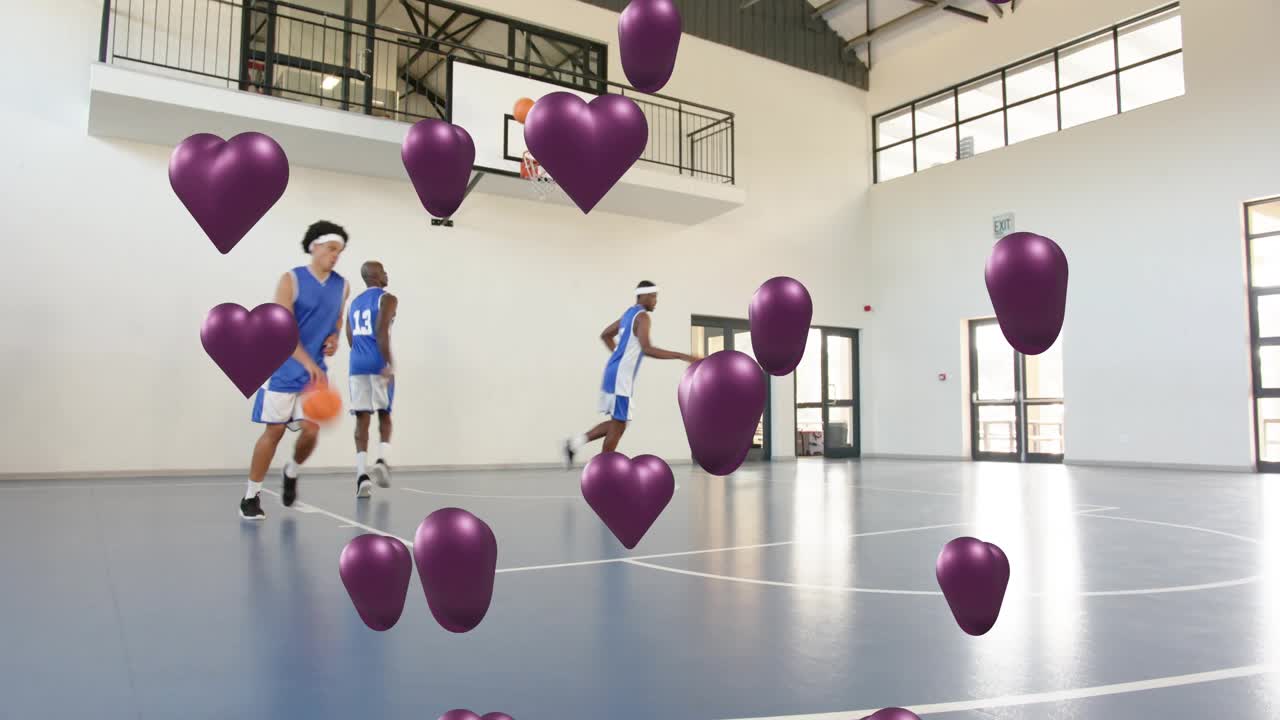N12 bola memantul melewati latihan menembak lingkaran basket saat tim memutar hati ungu yang menutupi pemain