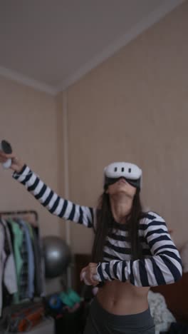 woman using vr headset and controllers