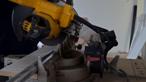 worker cutting metal with grinder. sparks while grinding iron