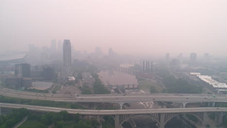 Ariel-over-Minneapolis-Interstate-35w-with-downtown-obscured-by-wildfire-smoke