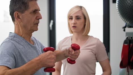 caucasian senior man working with therapist.