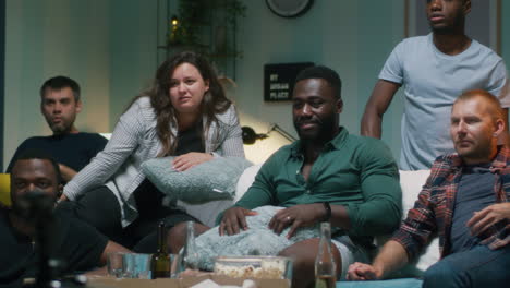 friends watching a game and having fun