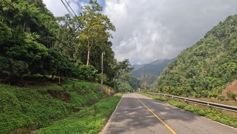 traveling through a lush mountainous landscape