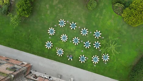 cinematic drone 4k shot of wedding tables in a italian villa