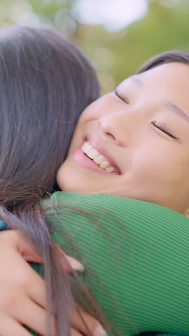 Joyful Hug: A Close-Up of Happy Friends Embracing