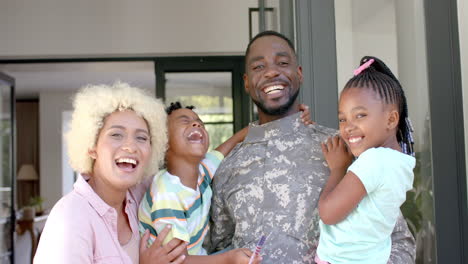 biracial family welcomes african american soldier father home