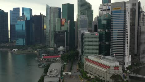 sunset storm sky singapore city downtown traffic bay aerial panorama 4k