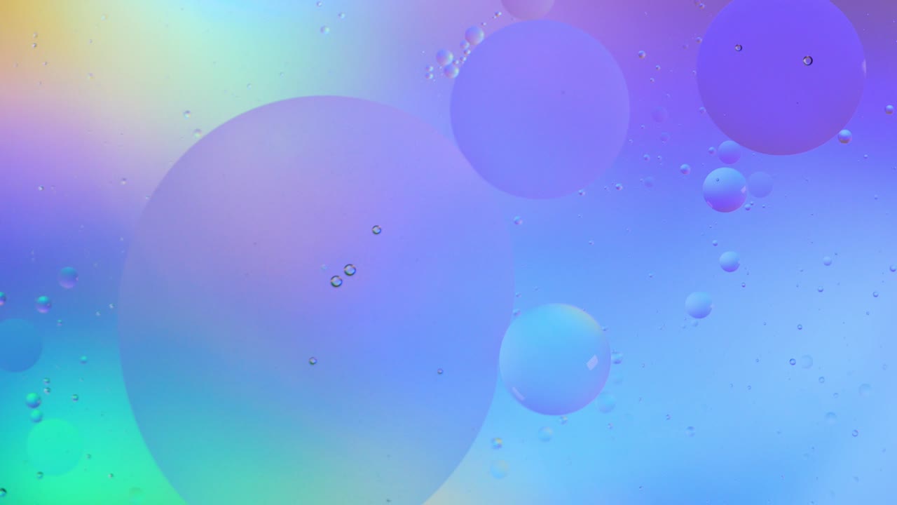 Colorful artistic of oil drop floating on the water.