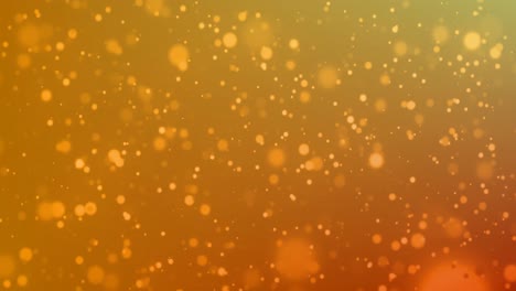 Digitally-generated-video-of-glowing-spots-moving-against-orange-background