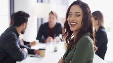 a-confident-young-businesswoman-having-a-boardroom