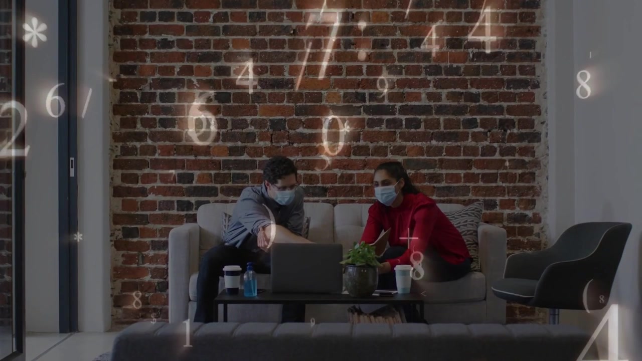 Team leaning over laptop tapping pad causing glowing digits overlay densifying for tech in lounge