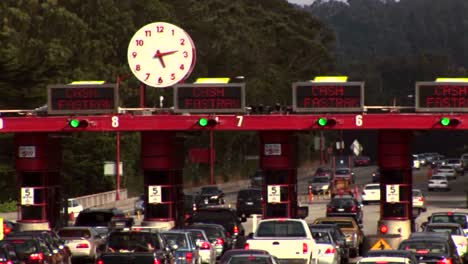 timelapse of traffic moving through a tollbooth