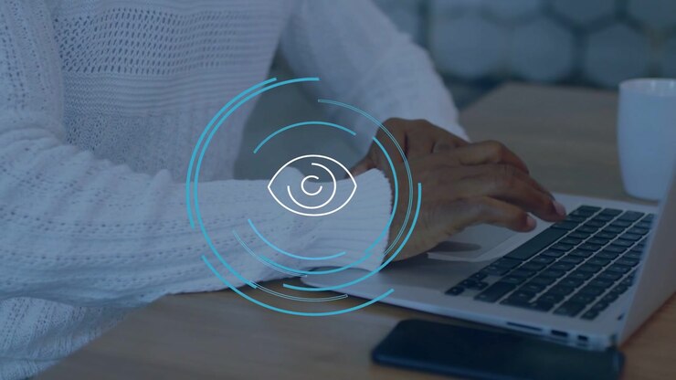 Blue eye overlay appearing, man testing voice and touch controls in tech workspace, guiding devices