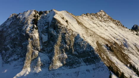 Rocky-Cliff-And-Summit-Of-La-Cape-au-Moine,-Revealing-The-Swiss-Alps-In-Background-At-Early-Winter-In-Montreux,-Vaud,-Switzerland