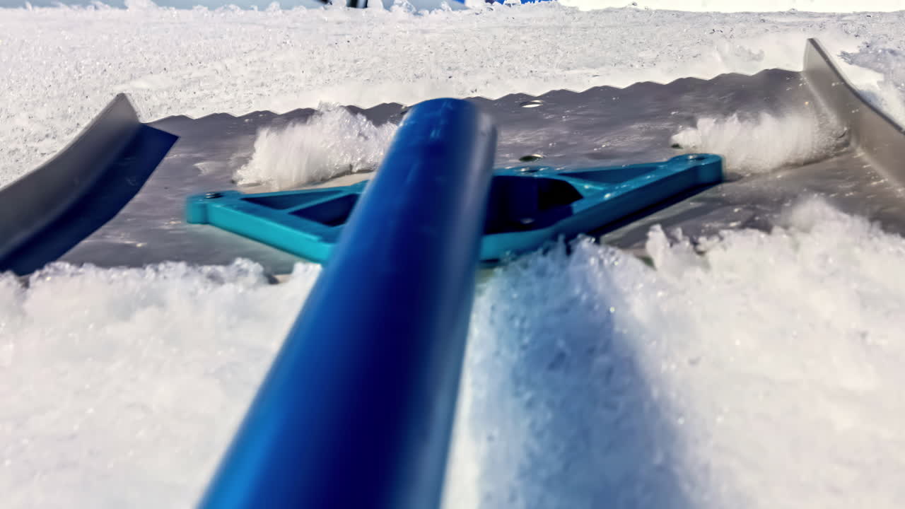 Time laps of snow melting off of an aluminum snow shovel