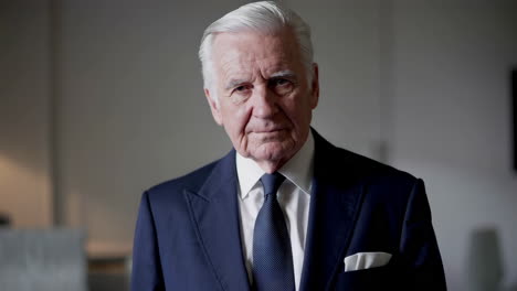 portrait of an elderly man in a suit