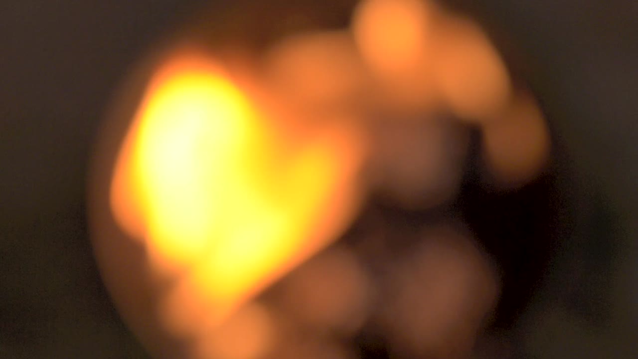 dreamy image of an out of focus bonfire with a deep bokeh on it