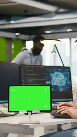 vertical video technician developing applications using chroma key tablet, integrating ai