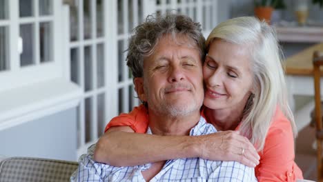 Senior-couple-romance-on-the-porch-at-home-4k