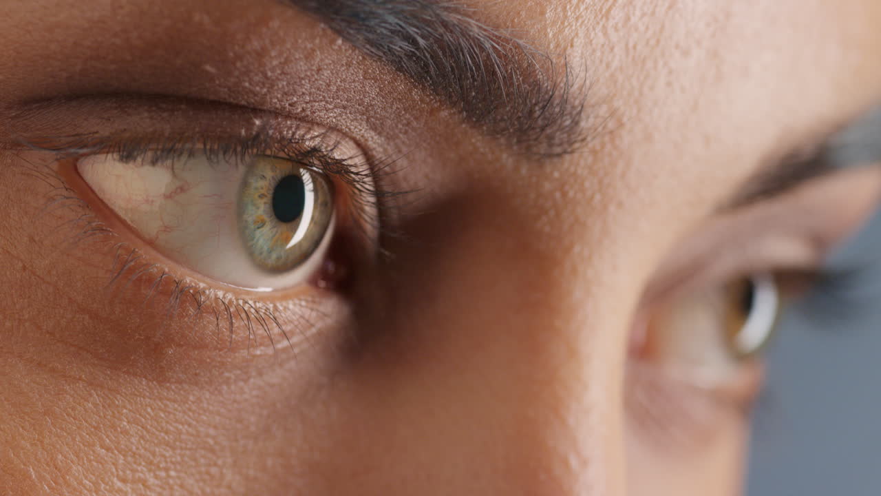 close up macro beauty eyes blinking natural female beauty cosmetics concept