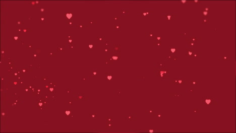 pink hearts falling on a dark red background