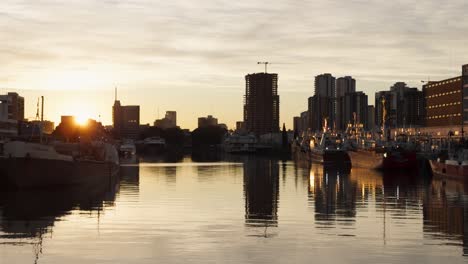 golden hour reflections, puerto madero skyline and docked ships