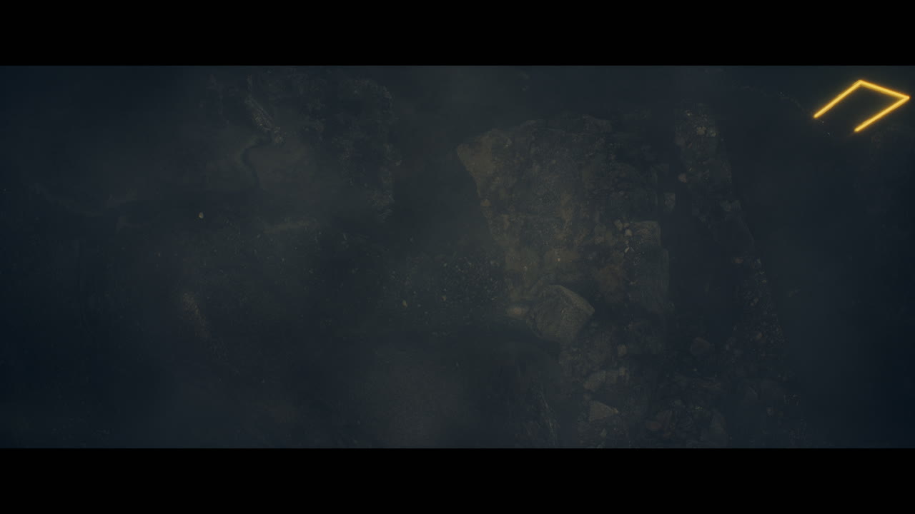 Rocky landscape with huge yellow light portal structures