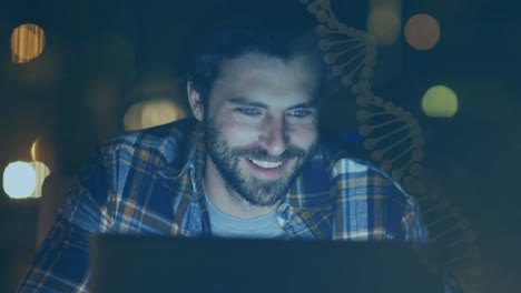 animación de datos científicos sobre un hombre caucásico feliz usando una computadora portátil