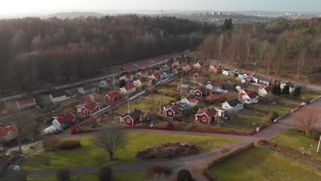 Aerial-footage-of-some-beautiful-picturesque-cottages-in-Delsjon,-Gothenburg,-Sweden-4