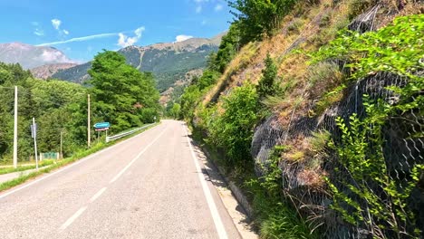 scenic mountain road with lush greenery