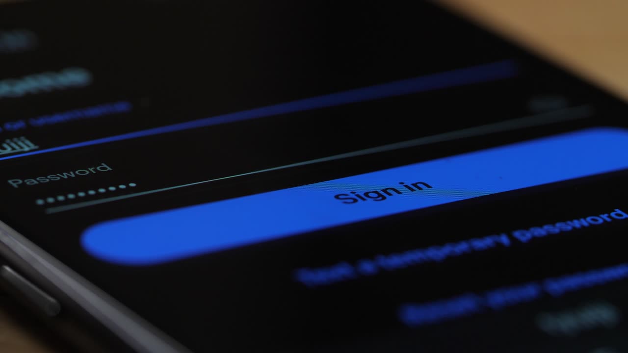 Macro Finger Touching Sign In Button On Authenticator On Smartphone